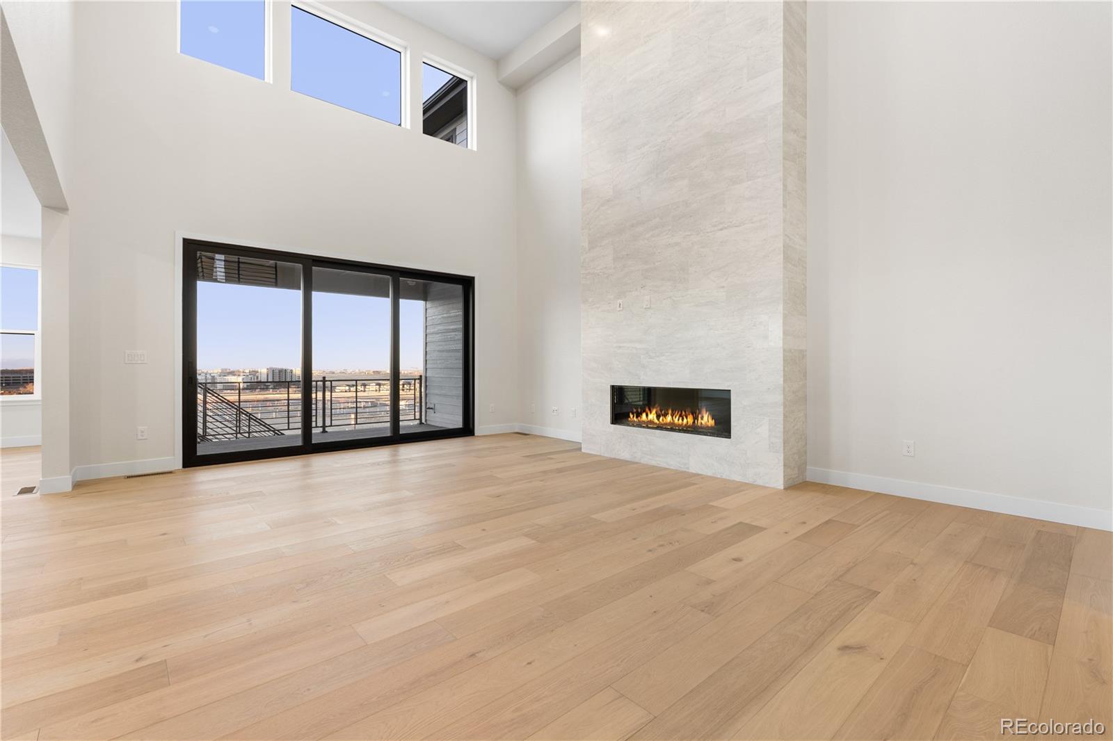 11283 Tenor Trail Lone Tree, CO 80134 - Photo 10 of 47 a view of an empty room with a window