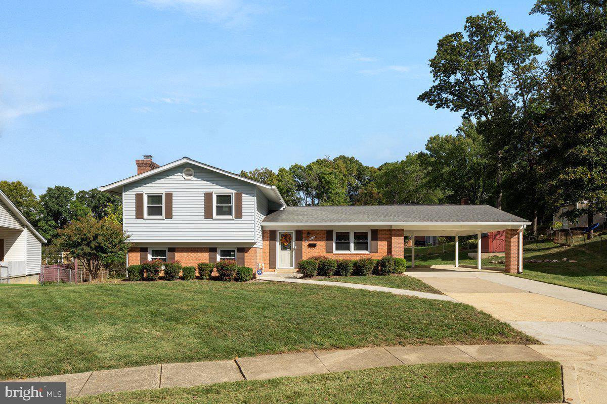 6434 Rives Court Springfield, VA 22150 - Photo 1 of 37 a front view of a house with a yard