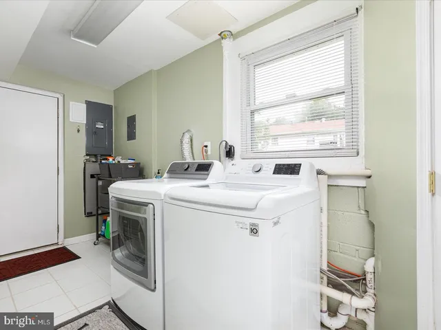 a bathroom with a sink and a window
