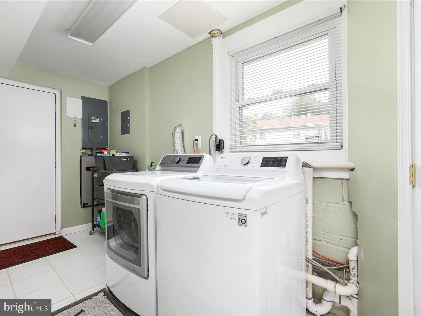 6434 Rives Court Springfield, VA 22150 - Photo 18 of 37 a bathroom with a sink and a window