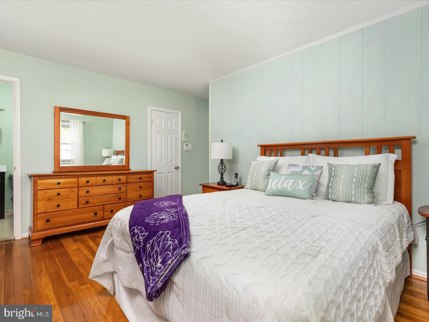 6434 Rives Court Springfield, VA 22150 - Photo 24 of 37 a bedroom with a bed and a dresser in it