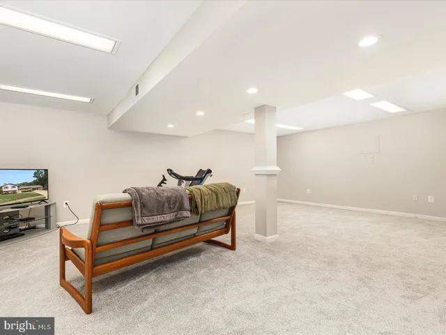 a living room with furniture and a couch