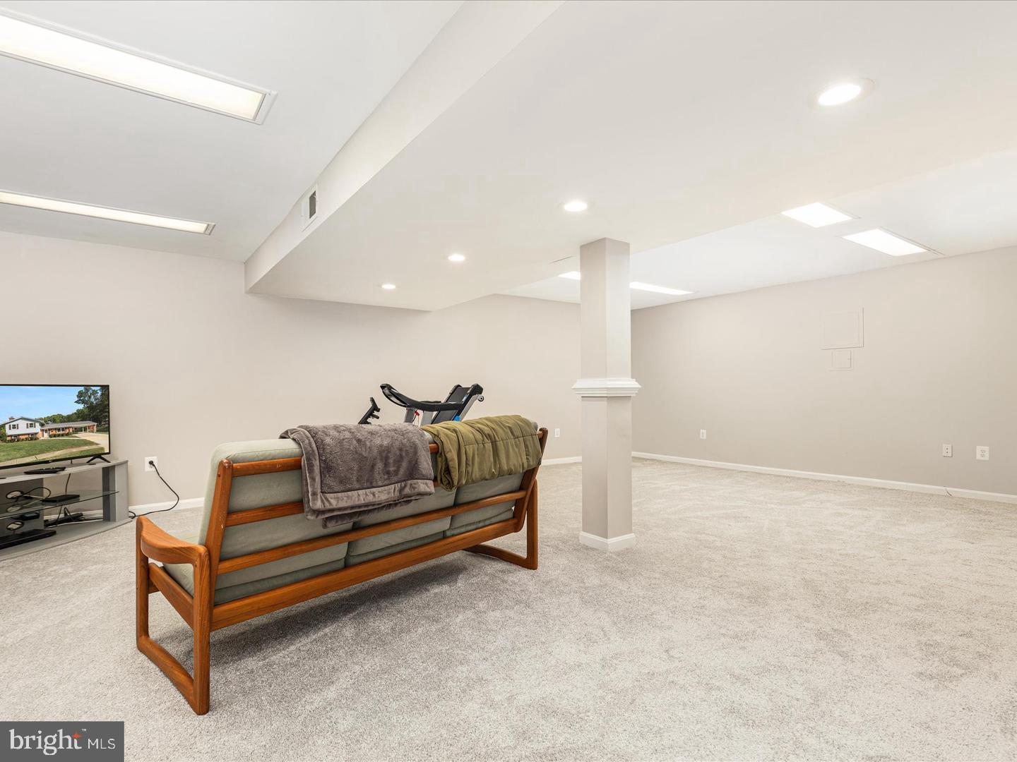 6434 Rives Court Springfield, VA 22150 - Photo 27 of 37 a living room with furniture and a couch