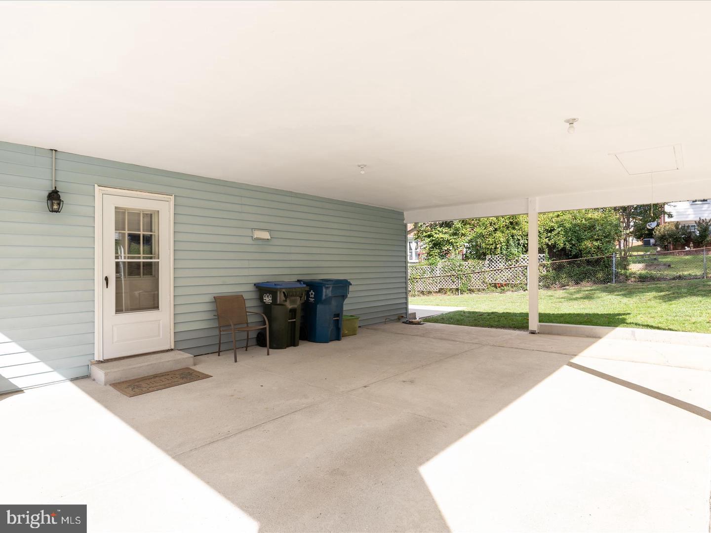 6434 Rives Court Springfield, VA 22150 - Photo 30 of 37 a view of a livingroom with a patio and a yard