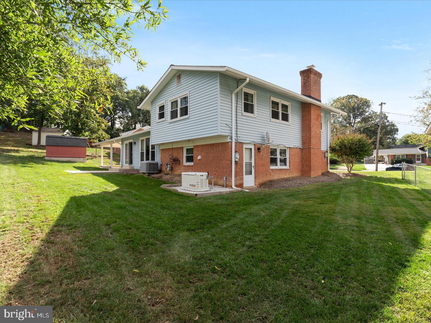 6434 Rives Court Springfield, VA 22150 - Photo 33 of 37 a view of a house with a yard