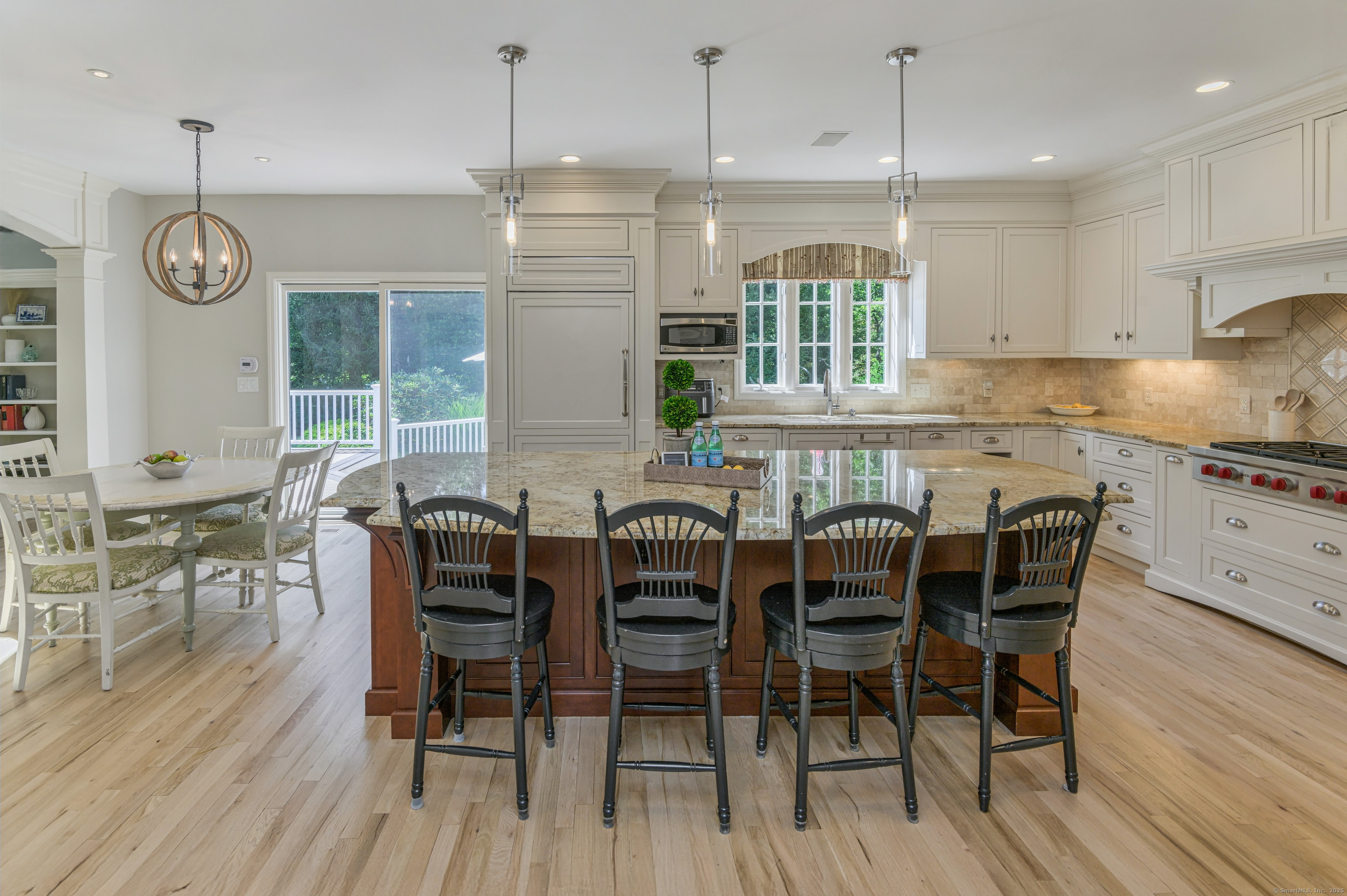 21 Schoolhouse Place Ridgefield, CT 06877 - Photo 11 of 40 a view of a dining room with furniture window and wooden floor