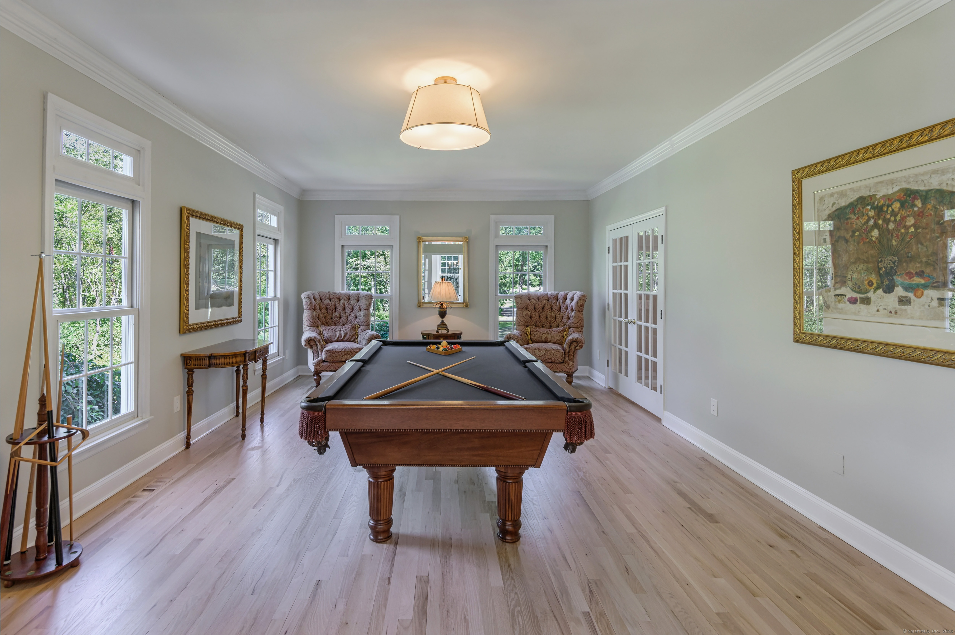 21 Schoolhouse Place Ridgefield, CT 06877 - Photo 17 of 40 a living room with furniture a window and wooden floor