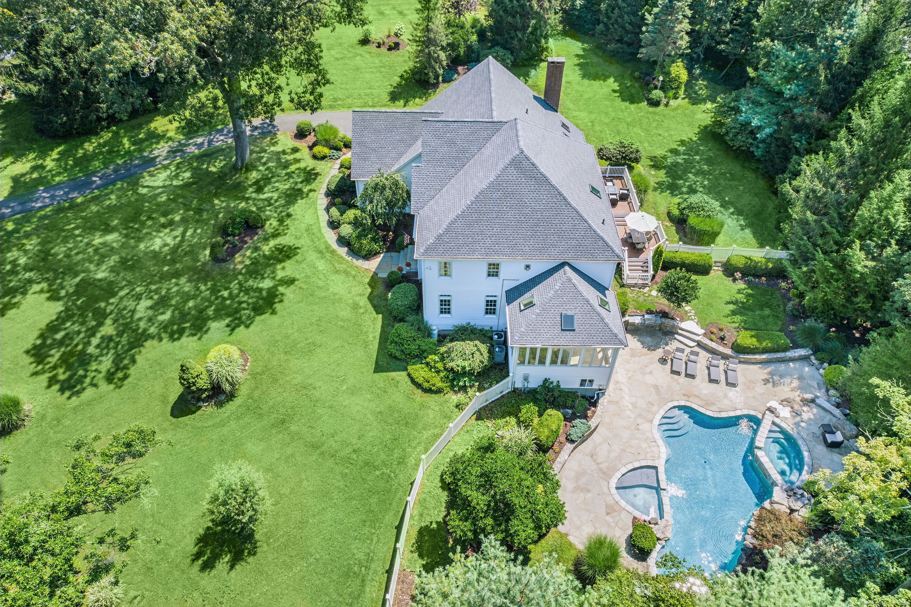 21 Schoolhouse Place Ridgefield, CT 06877 - Photo 2 of 40 an aerial view of a house with yard