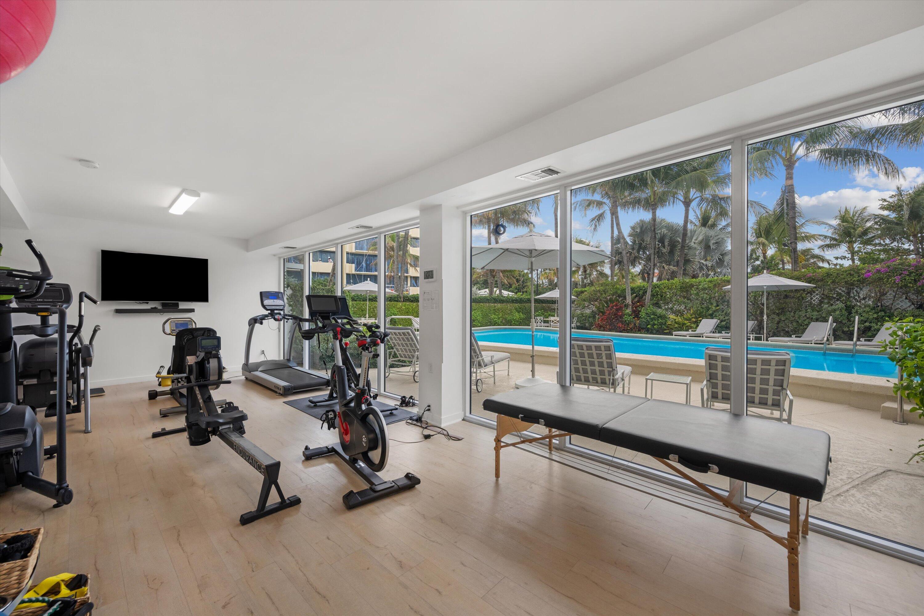 300 South Ocean Boulevard, Unit 4F Palm Beach, FL 33480 - Photo 16 of 19 a view of a room with gym equipment