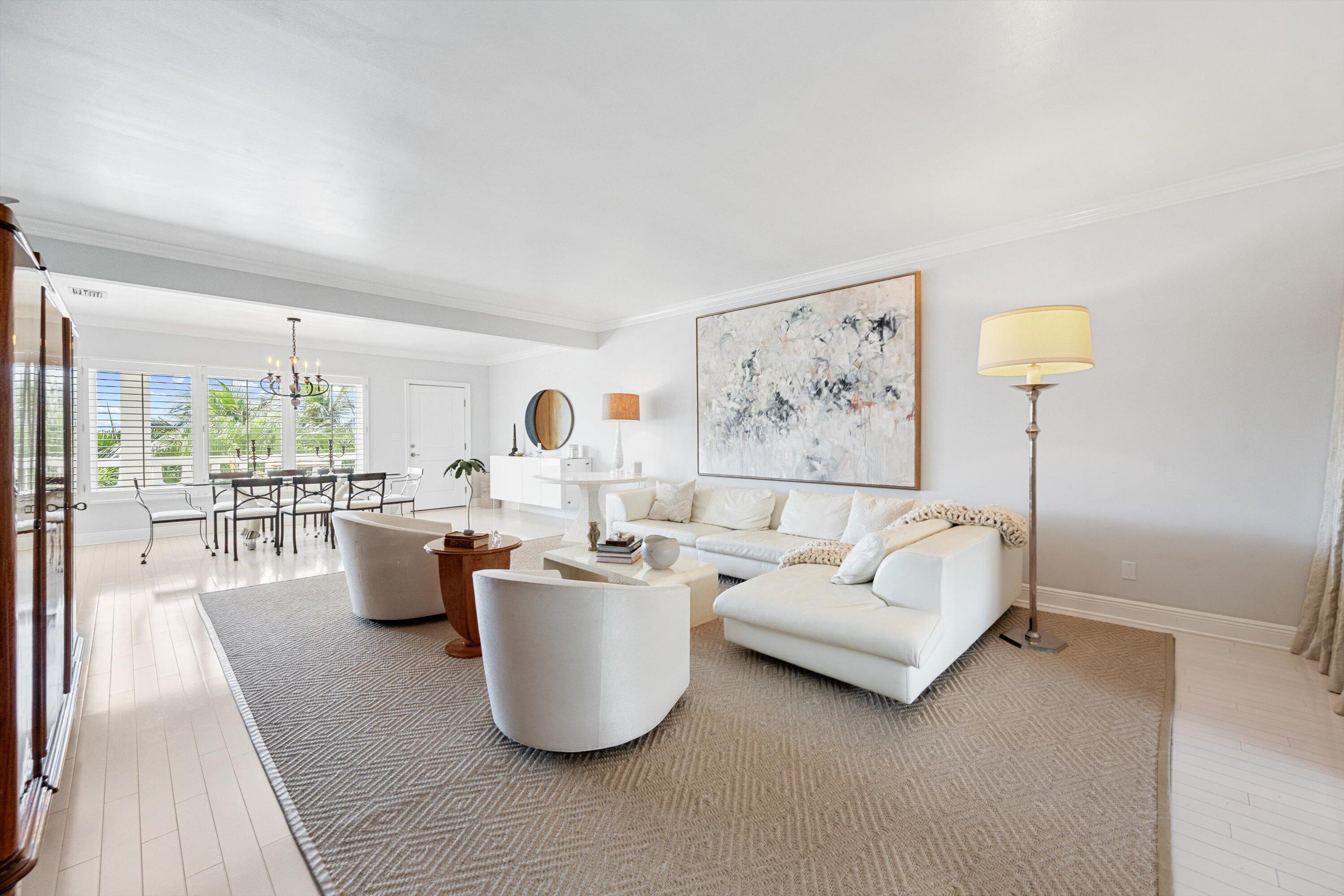 300 South Ocean Boulevard, Unit 4F Palm Beach, FL 33480 - Photo 5 of 19 a living room with furniture a window and a table