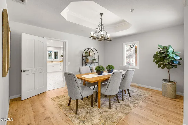 a large kitchen with a large window