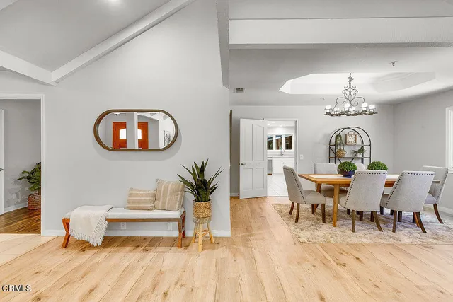 a kitchen with sink and cabinets