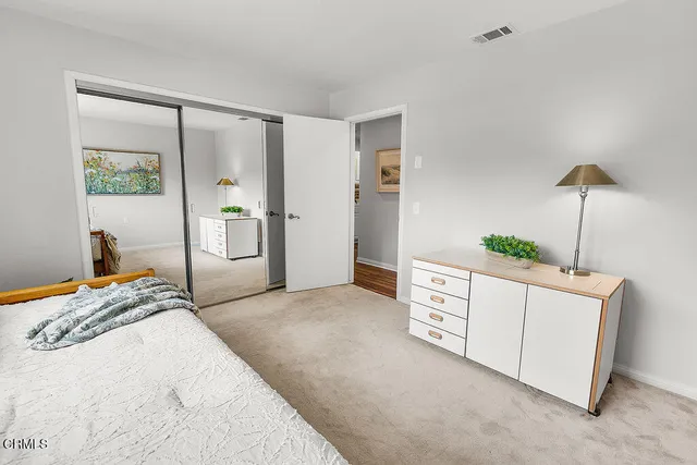 a view of a car park in front of a house