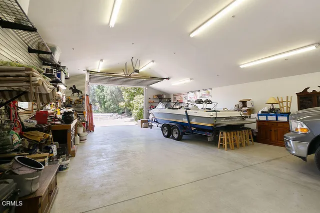 a room with lots of furniture and clutter