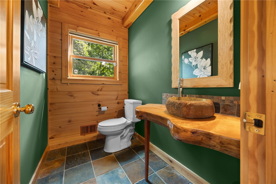 1265 South Lake Road Middlesex, NY 14507 - Photo 25 of 50 Main floor 1/2 bath w/custom vanity