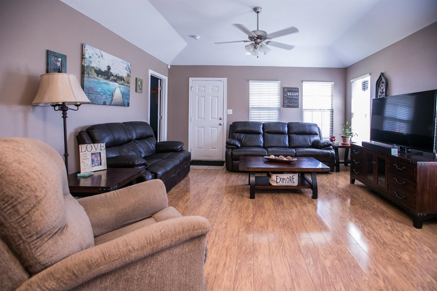 2204 100th Street Lubbock, TX 79423 - Photo 3 of 10 a living room with furniture and a flat screen tv