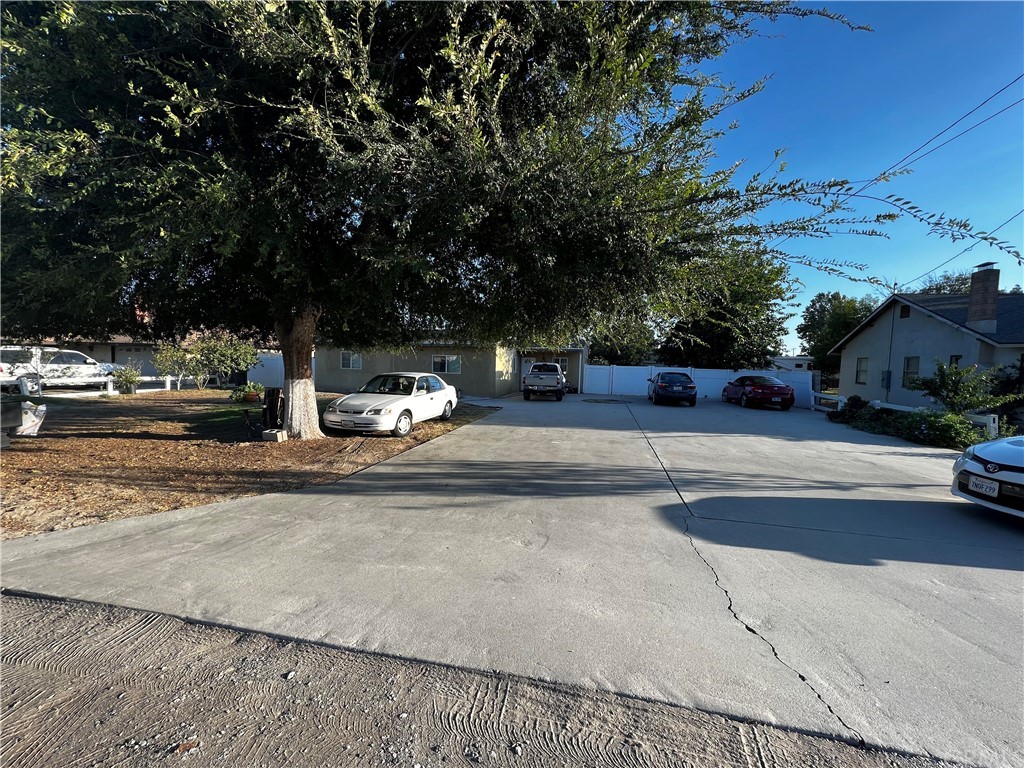3942 Carter Avenue Riverside, CA 92501 - Photo 1 of 1 a view of a street with houses