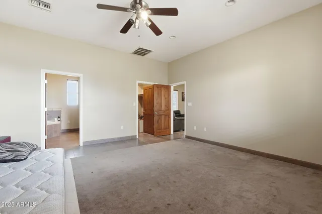 a bathroom with a tub and shower