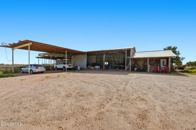a view of a garage with parked cars