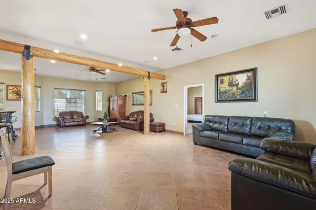 a view of a living room and dining room