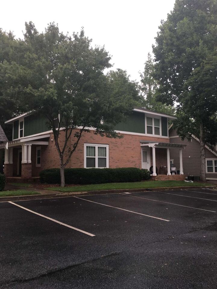 490 Barnett Shoals Road, Unit 724 Athens, GA 30605 - Photo 1 of 1 a front view of a house with a road