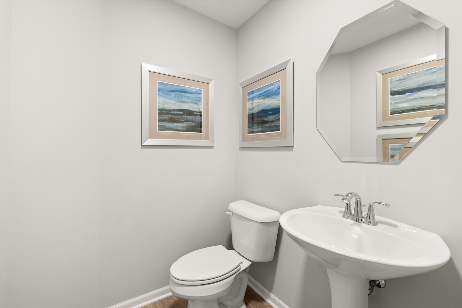 517 Wolverine Drive Aurora, IL 60502 - Photo 13 of 30 a white toilet sitting next to a bathroom sink