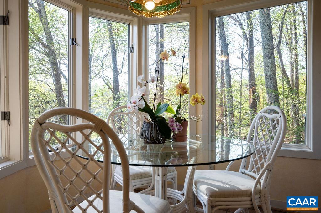340 Cedar Bluff Road Charlottesville, VA 22901 - Photo 20 of 75 a view of a dining room with furniture window and outside view