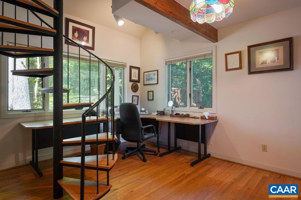 340 Cedar Bluff Road Charlottesville, VA 22901 - Photo 21 of 75 a view of a workspace with furniture window and wooden floor