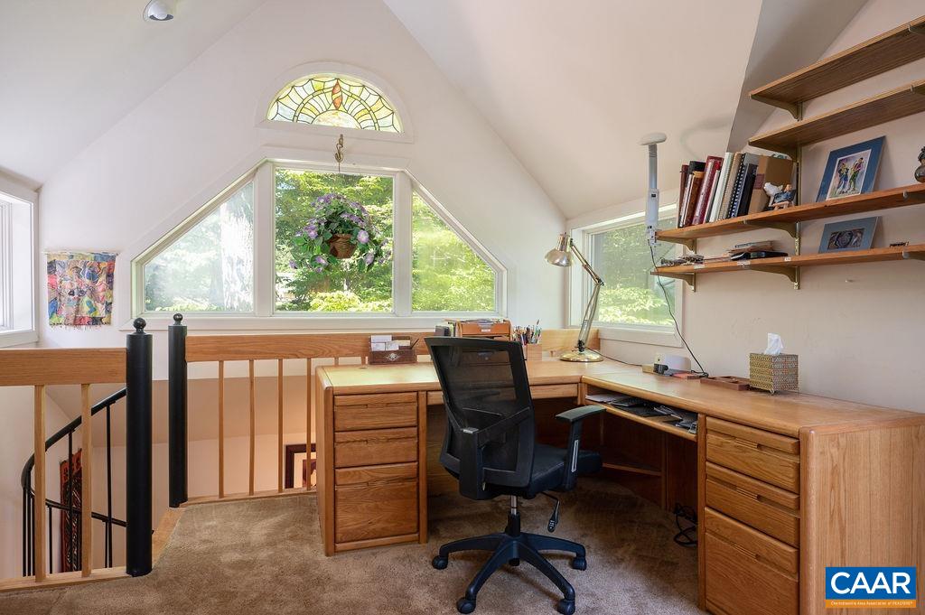 340 Cedar Bluff Road Charlottesville, VA 22901 - Photo 22 of 75 a view of a workspace with furniture and a window