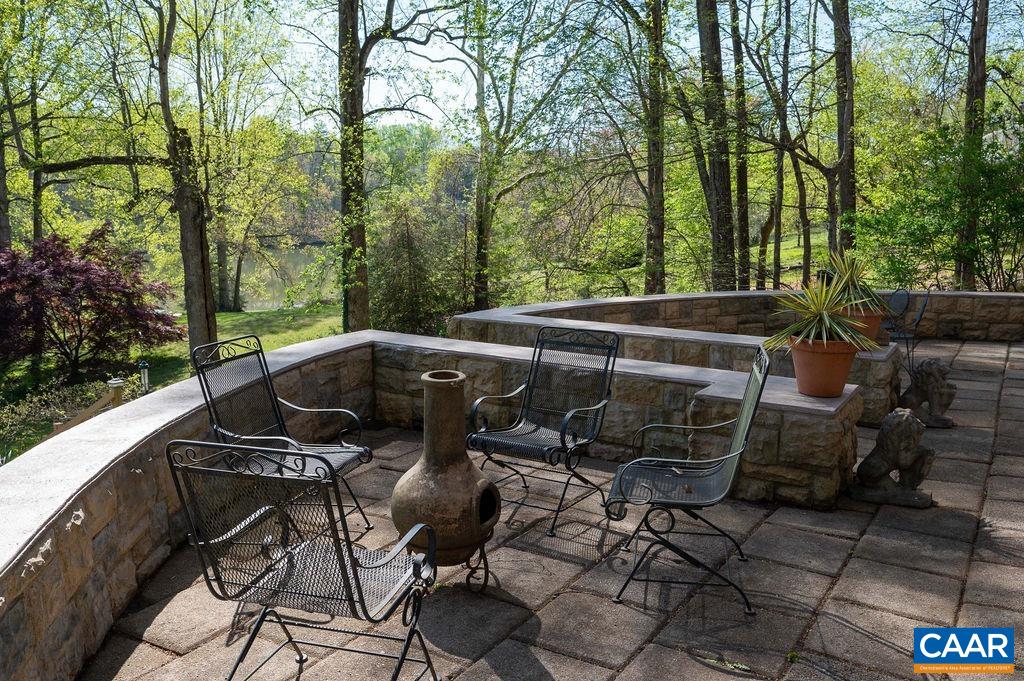 340 Cedar Bluff Road Charlottesville, VA 22901 - Photo 53 of 75 a view of a backyard with sitting area