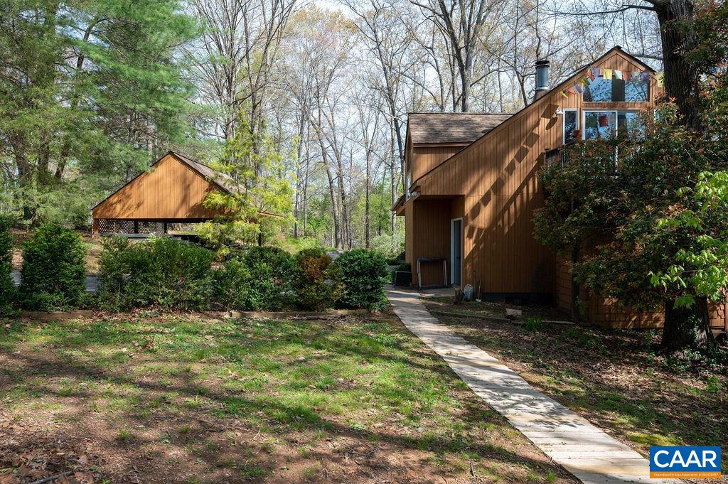 340 Cedar Bluff Road Charlottesville, VA 22901 - Photo 63 of 75 a backyard of a house with lots of green space