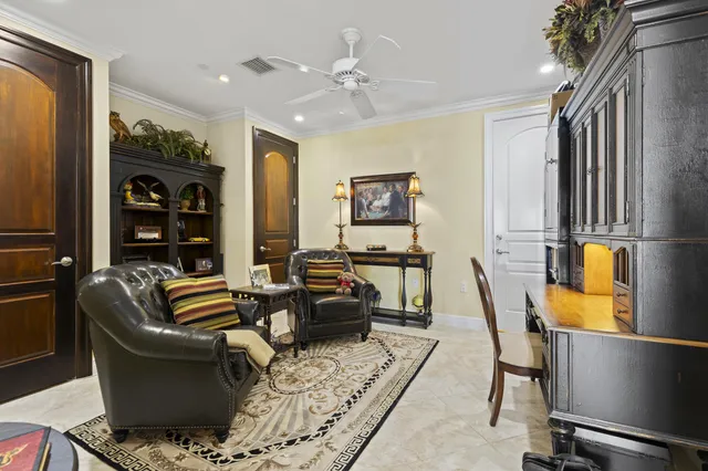 a living room with furniture fireplace and a flat screen tv