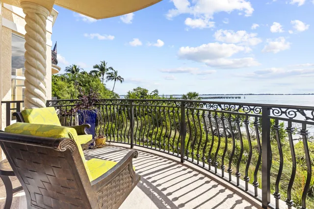 a view of a balcony with lake view and mountain view