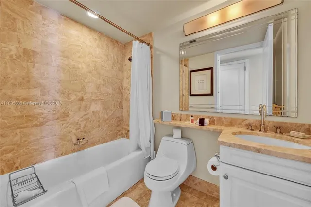 a bedroom with two beds and a large window with outer view