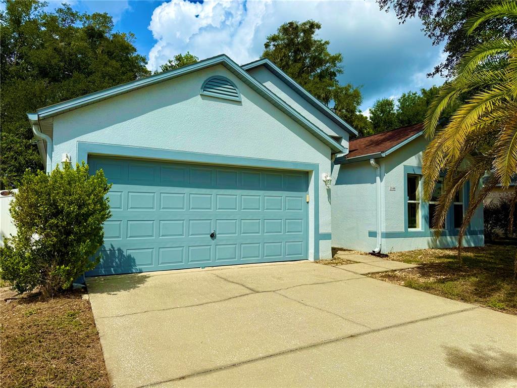 1346 Rolling River Road DeLand, FL 32720 - Photo 2 of 31 a house with a outdoor space