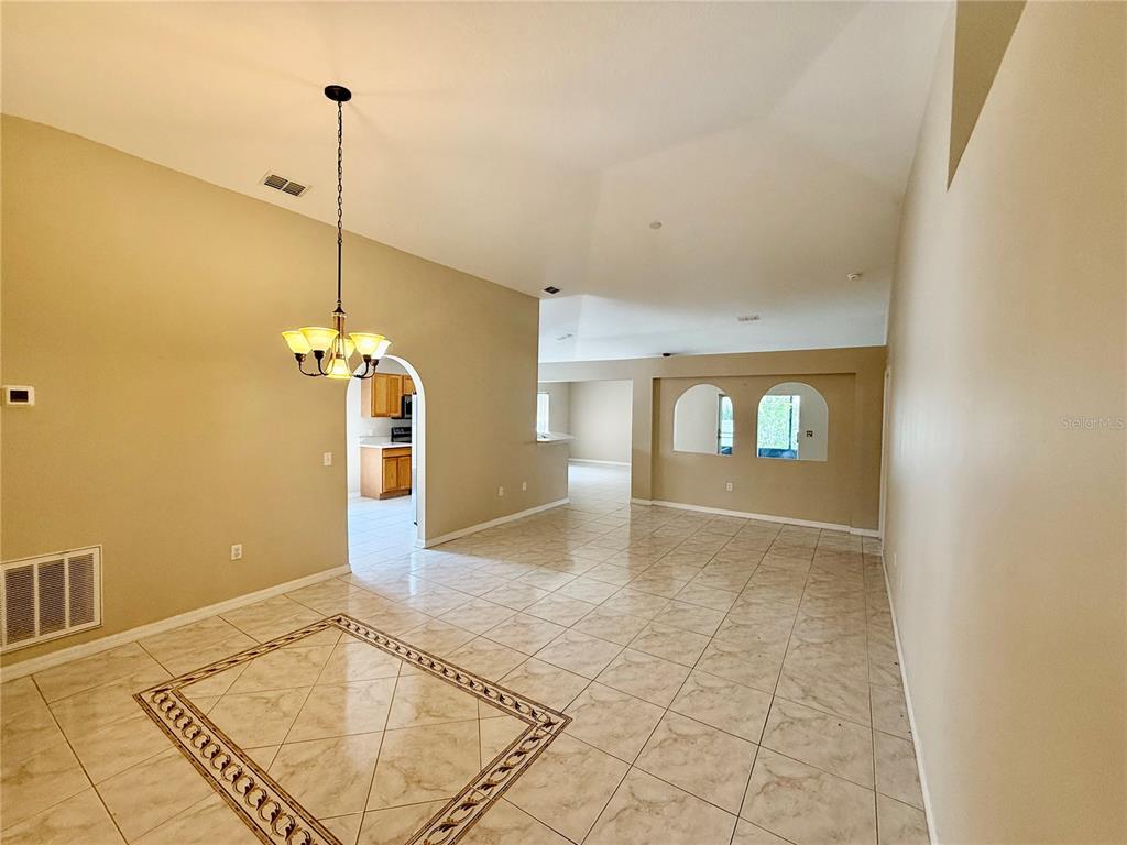 1346 Rolling River Road DeLand, FL 32720 - Photo 5 of 31 a view of an empty room and window