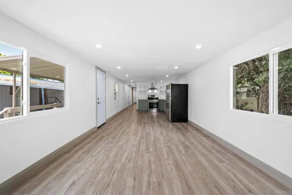 a view of livingroom with furniture and wooden floor