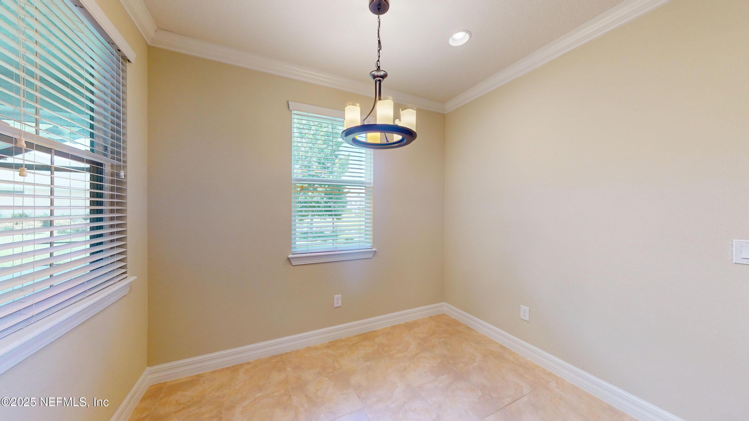 29 Lakefront Lane St. Augustine, FL 32095 - Photo 11 of 32 a view of a room with a window and ceiling fan