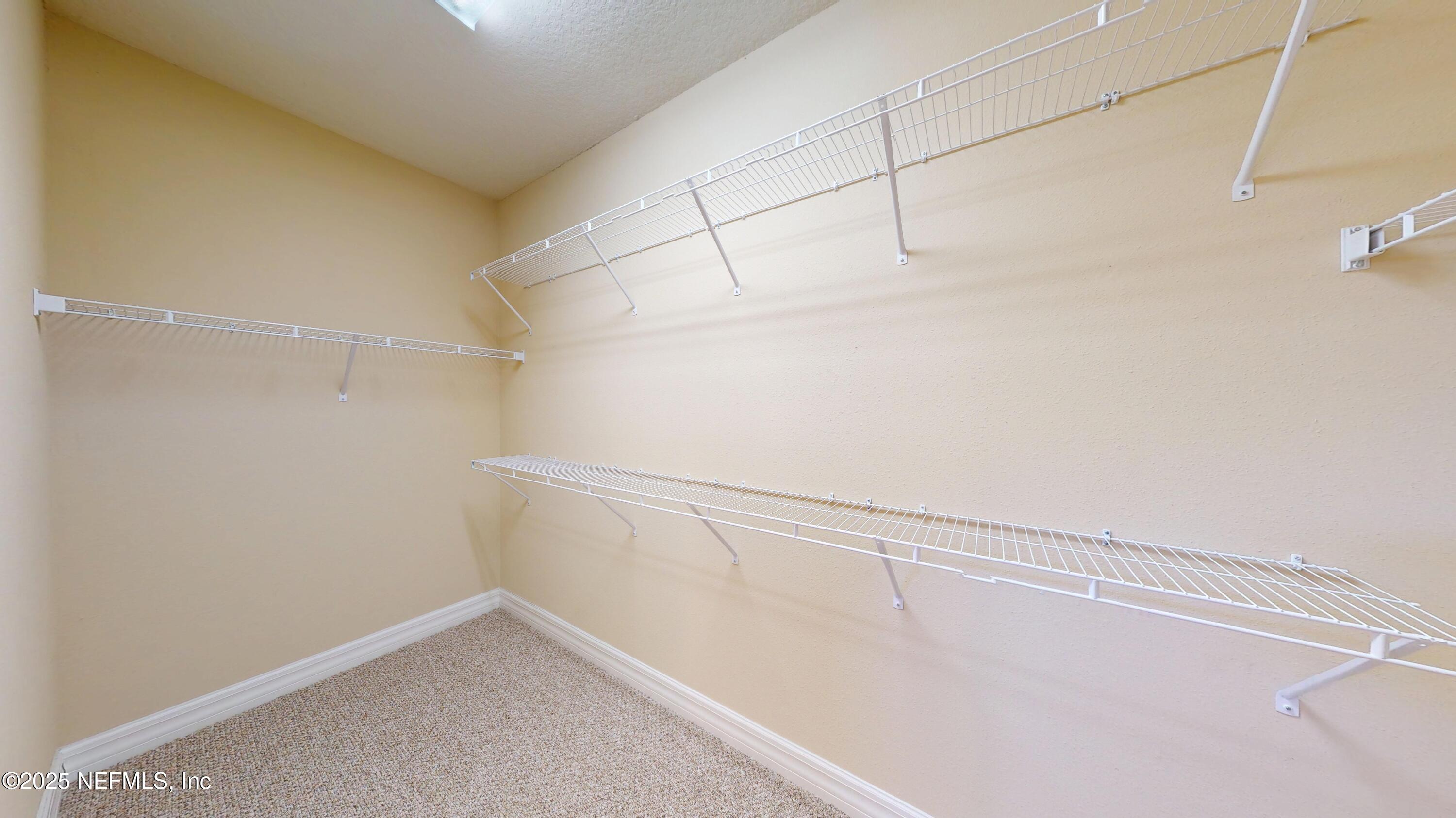 29 Lakefront Lane St. Augustine, FL 32095 - Photo 23 of 32 a view of a room with racks on the wall