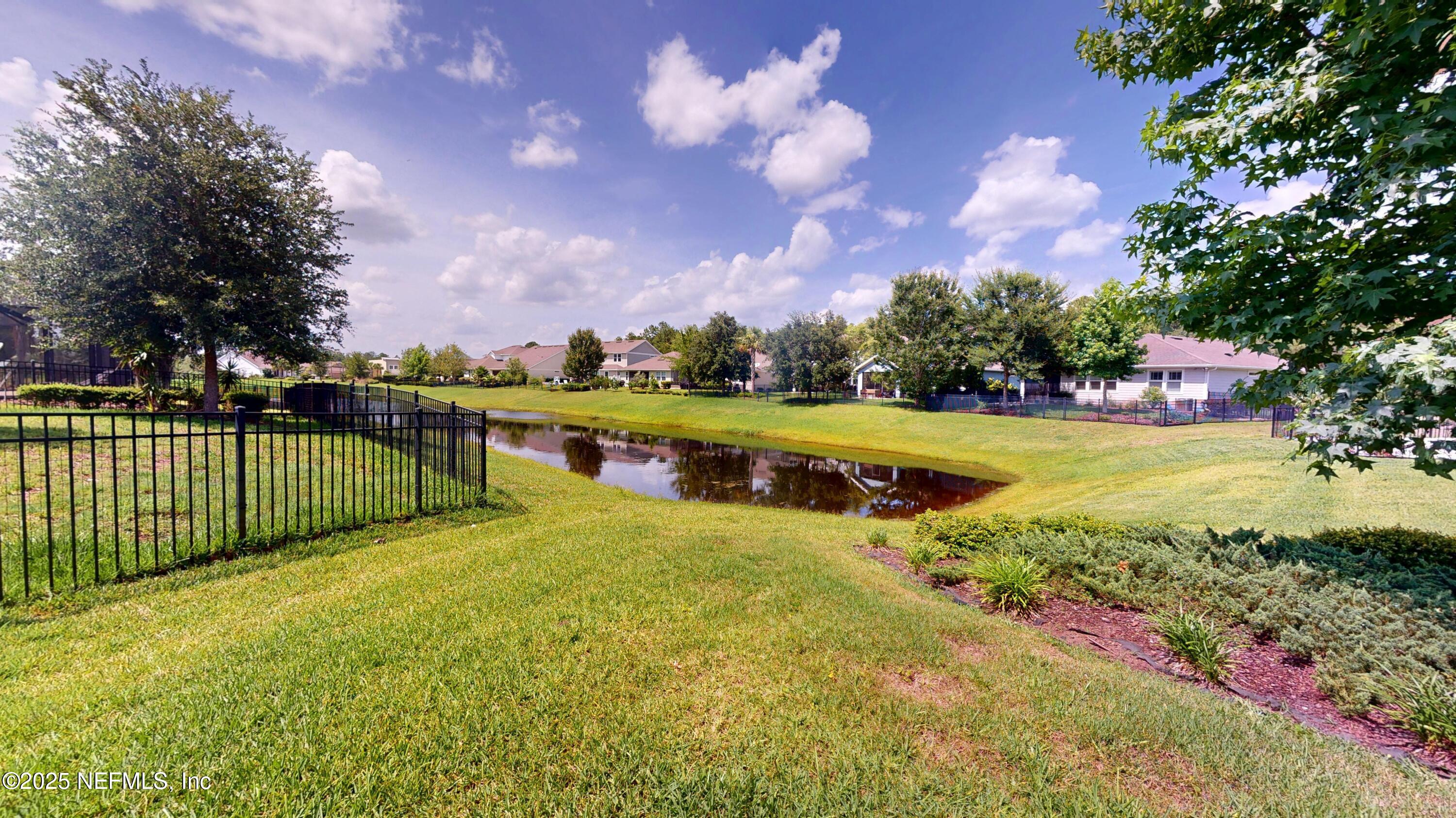 29 Lakefront Lane St. Augustine, FL 32095 - Photo 29 of 32 a view of a garden with swimming pool and an outdoor seating