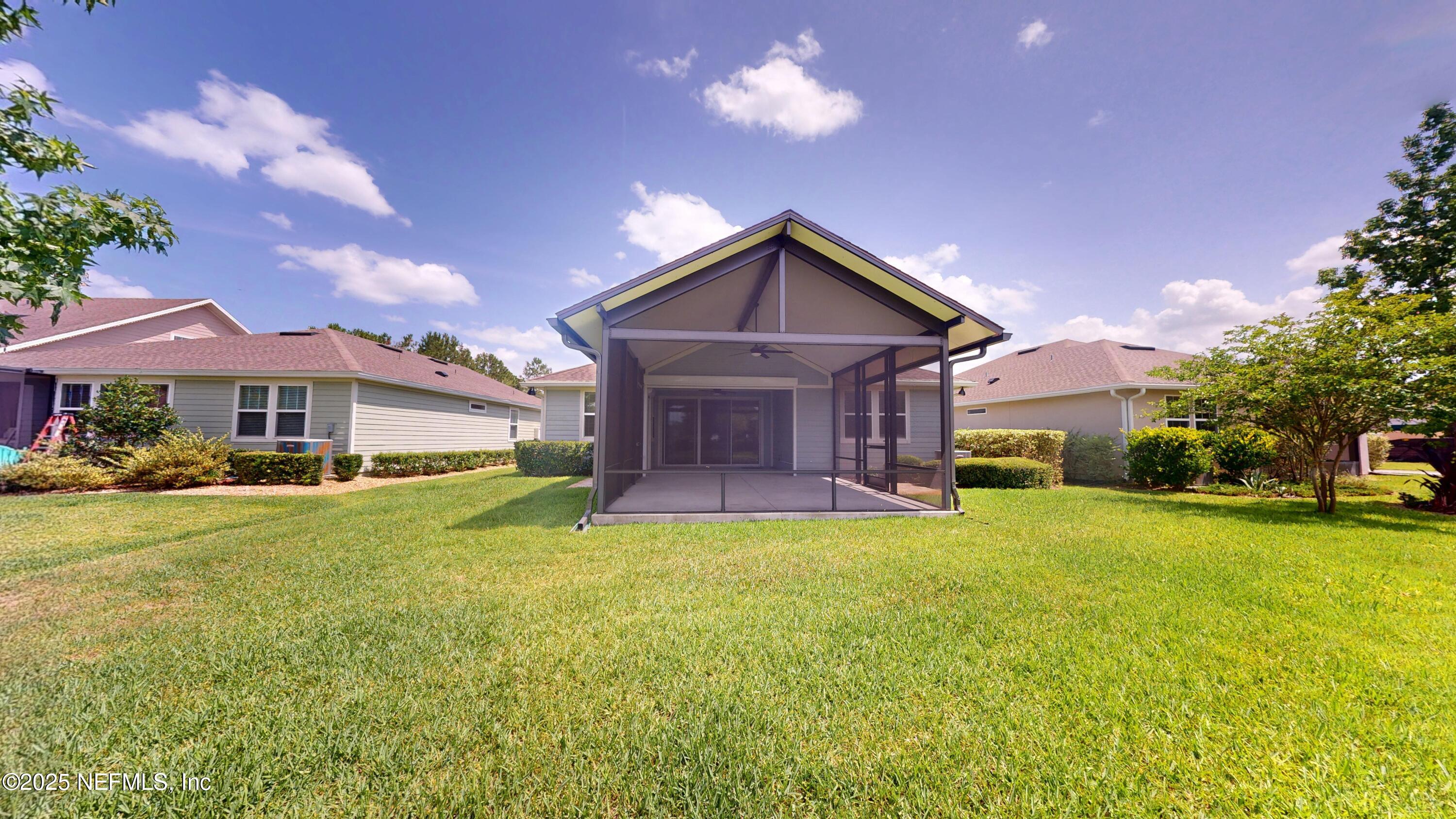 29 Lakefront Lane St. Augustine, FL 32095 - Photo 30 of 32 a front view of a house with garden