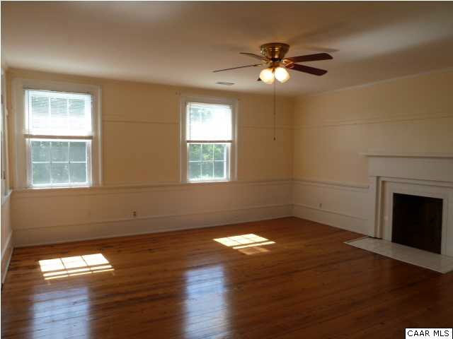 803 Valley View Road Ruckersville, VA 22968 - Photo 17 of 21 a view of an empty room with wooden floor and a window