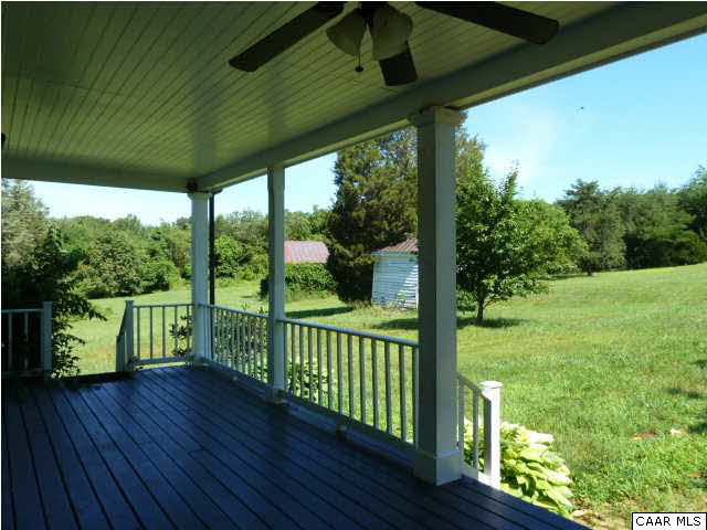 803 Valley View Road Ruckersville, VA 22968 - Photo 18 of 21 a view of a porch with a big yard
