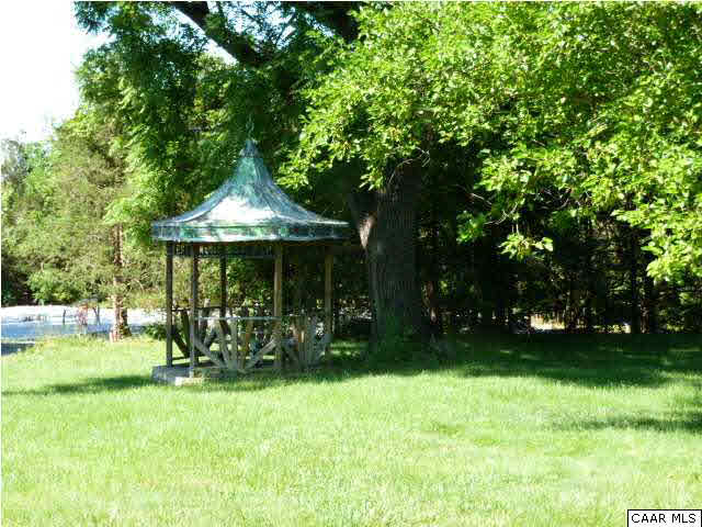 803 Valley View Road Ruckersville, VA 22968 - Photo 20 of 21 a front view of a house with garden