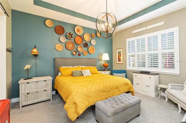 a bathroom with a granite countertop sink a mirror and a shower