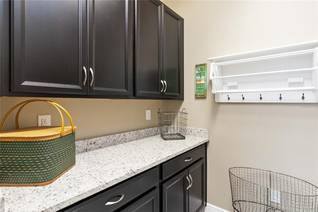 2463 Datura Loop St. Cloud, FL 34772 - Photo 30 of 57 a bathroom with a sink and a mirror