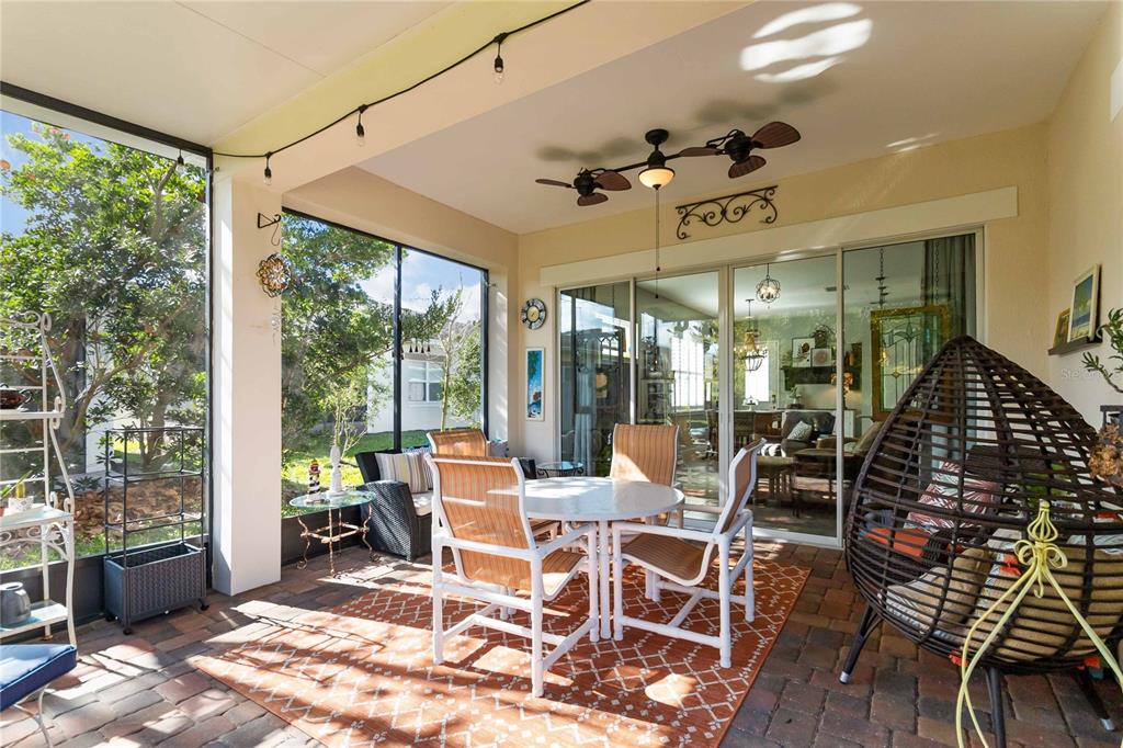 2463 Datura Loop St. Cloud, FL 34772 - Photo 38 of 57 a view of a dining room with furniture wooden floor and chandelier
