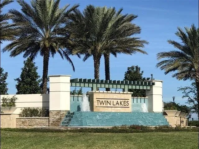 a room with furniture pool table and window
