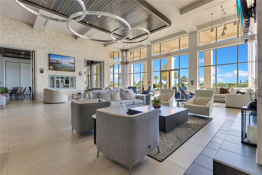 2463 Datura Loop St. Cloud, FL 34772 - Photo 49 of 57 a living room with fireplace furniture and a large window