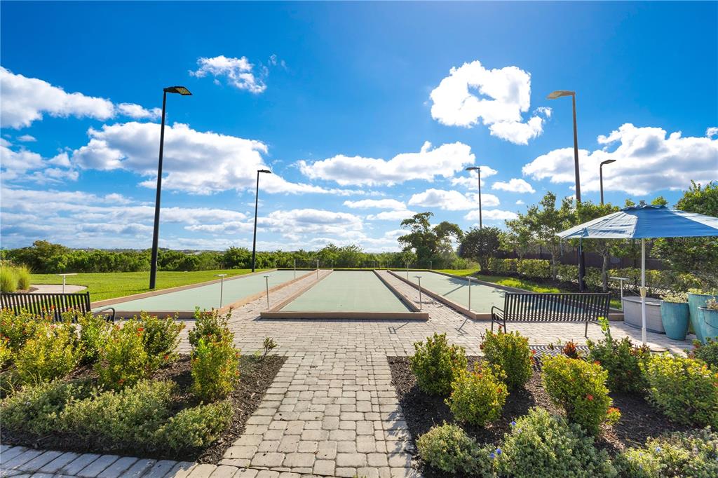 2463 Datura Loop St. Cloud, FL 34772 - Photo 55 of 57 a view of a swimming pool with a patio